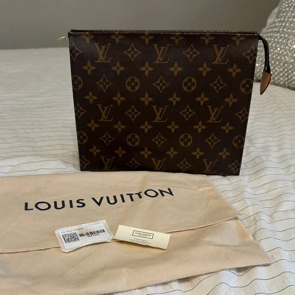 Louis Vuitton Monogram Toiletry Bag in Brown - Picture 1 of 16
